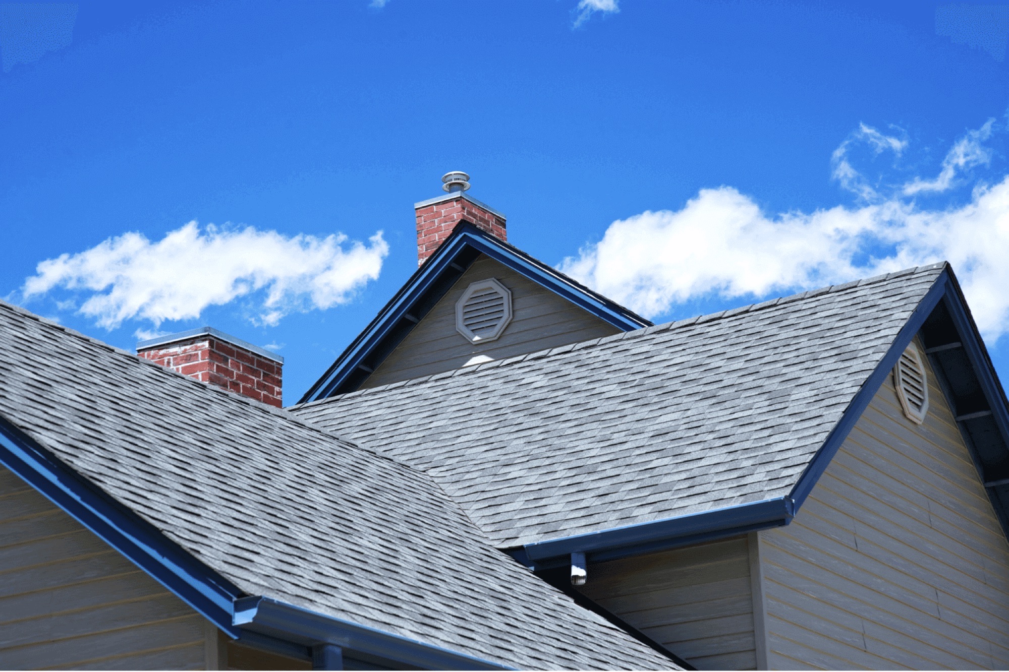 Newly installed grey architectural asphalt shingle roof